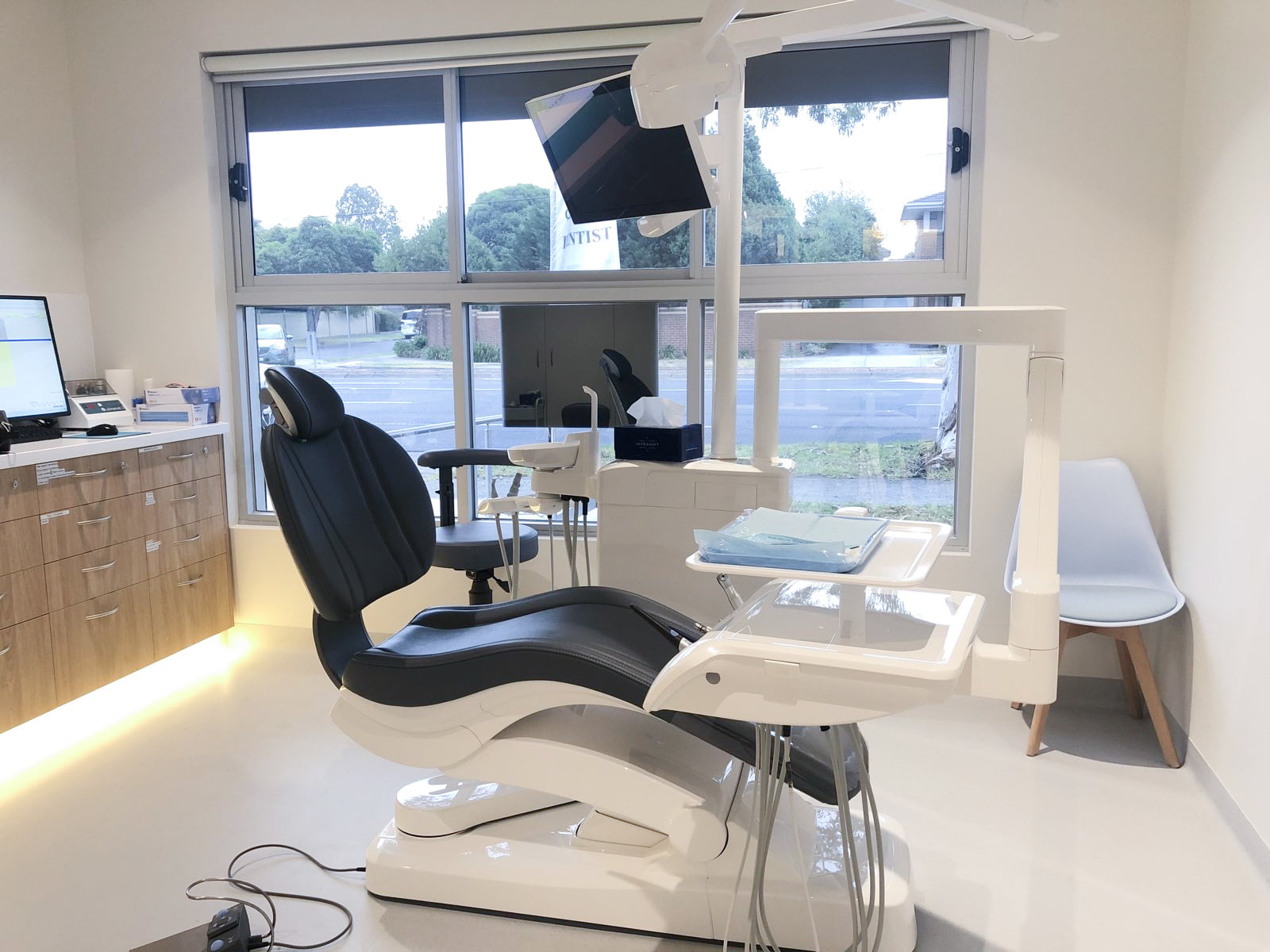 A dental surgery room at Rising Era Dental